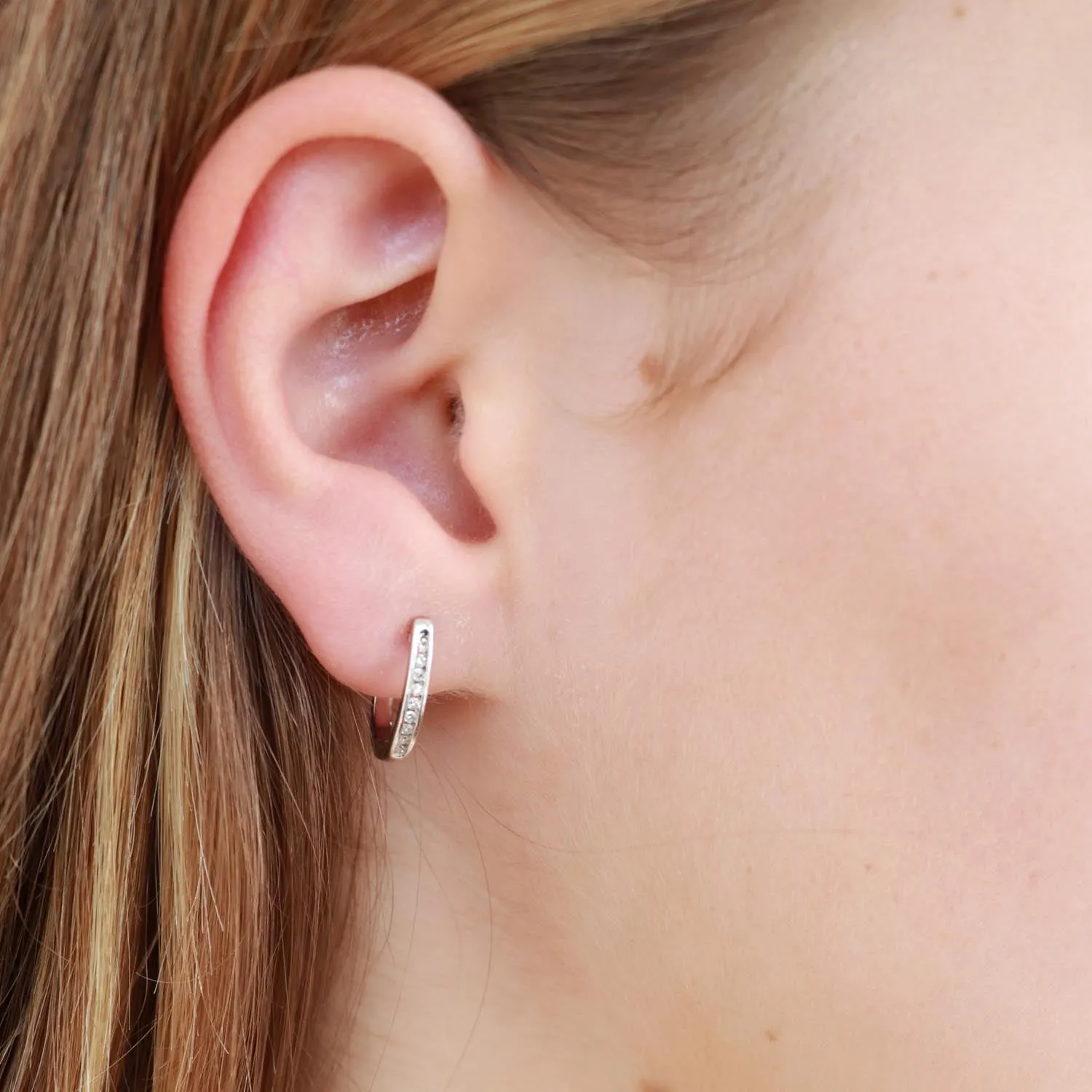 0.08ct Diamond Huggie Earrings In 9Ct White Gold