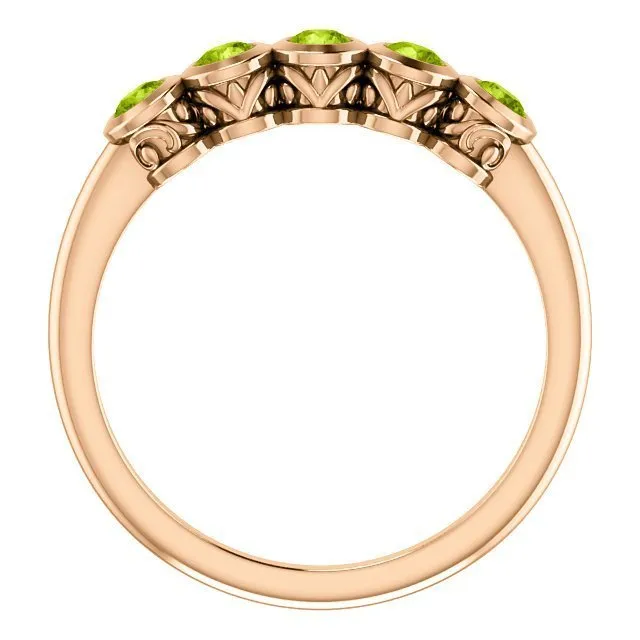 14KT GOLD .45 CTW ROUND PERIDOT BEZEL-SET 5 STONE RING