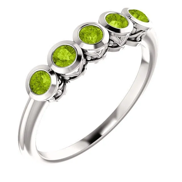 14KT GOLD .45 CTW ROUND PERIDOT BEZEL-SET 5 STONE RING