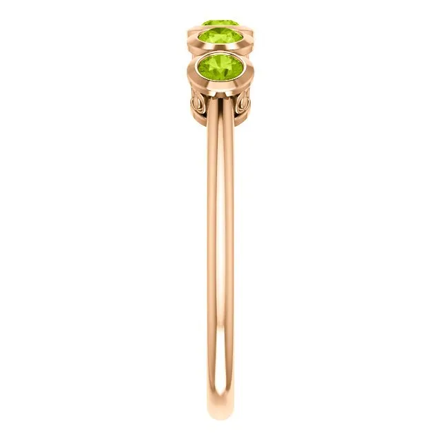 14KT GOLD .45 CTW ROUND PERIDOT BEZEL-SET 5 STONE RING