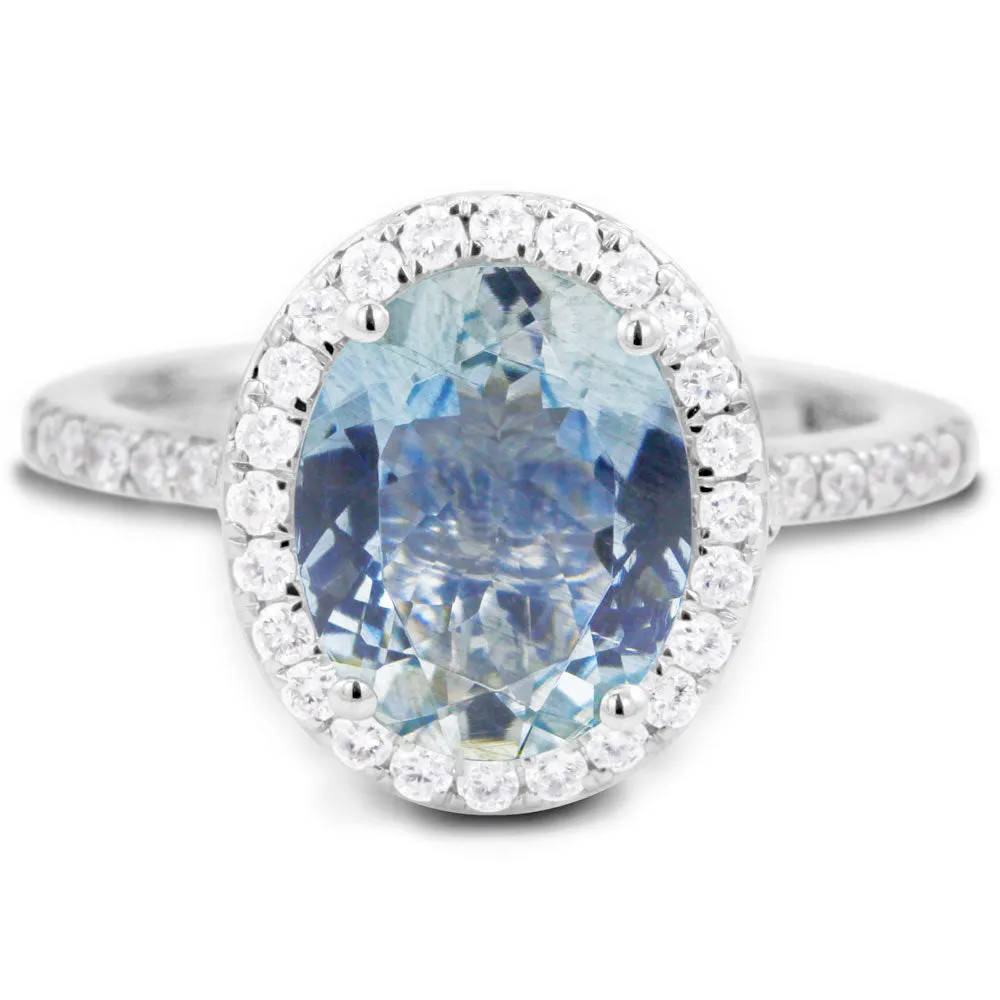 18ct White Gold 2.49ct Oval Cut Aquamarine With 0.40ct Diamond Halo and Diamond Set Shoulders Ring