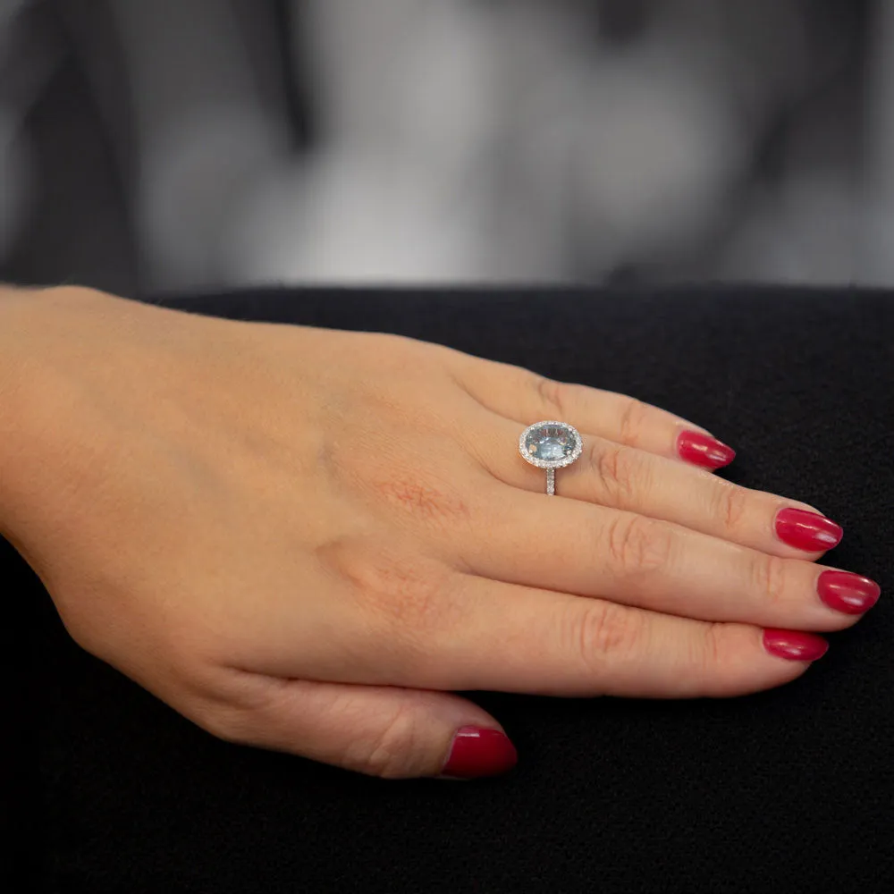 18ct White Gold 2.49ct Oval Cut Aquamarine With 0.40ct Diamond Halo and Diamond Set Shoulders Ring