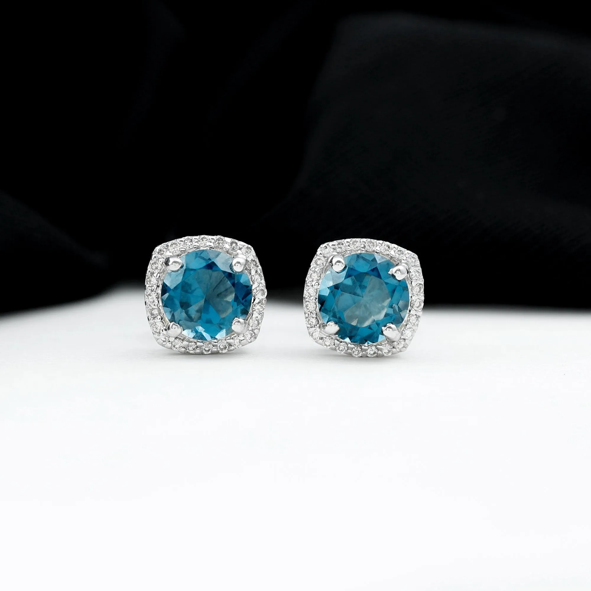 London Blue Topaz and Diamond Halo Stud Earrings