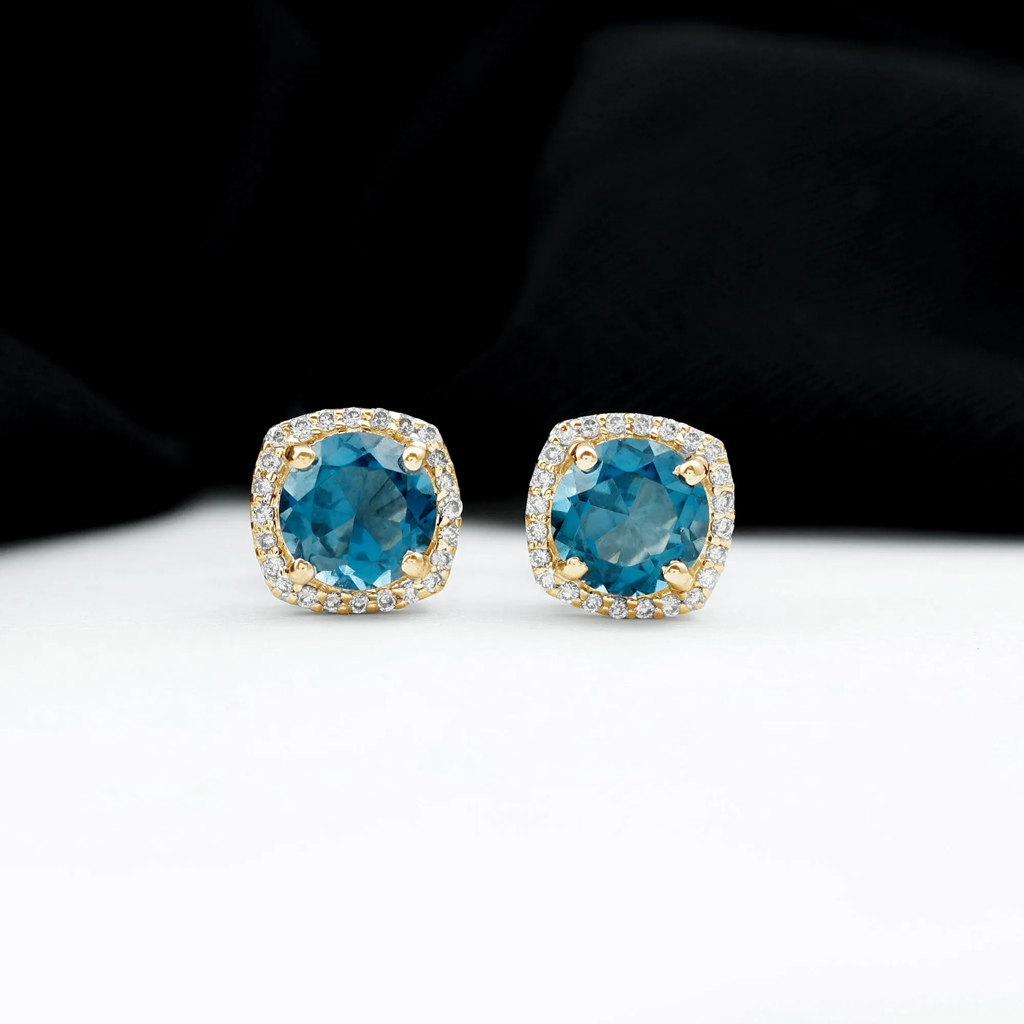 London Blue Topaz and Diamond Halo Stud Earrings