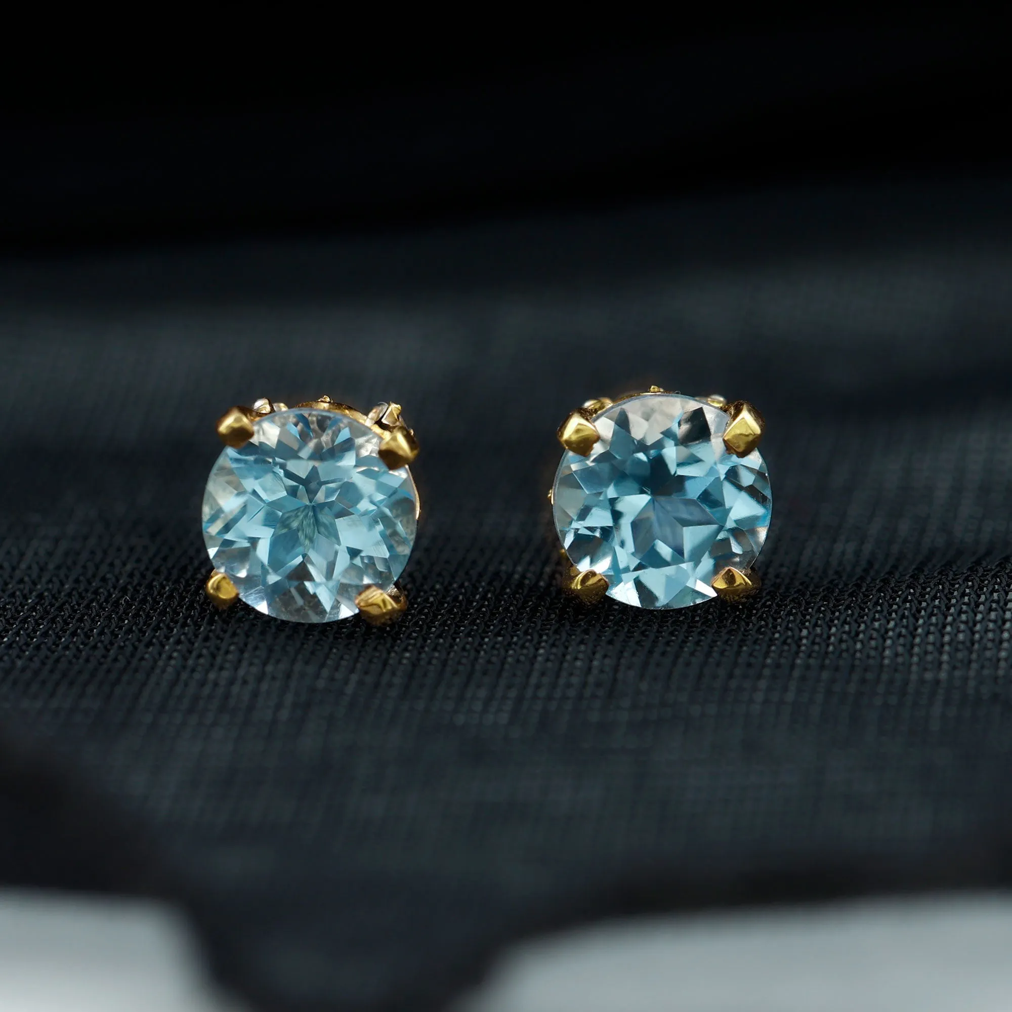 Peg Head Set Sky Blue Topaz and Diamond Solitaire Stud Earrings