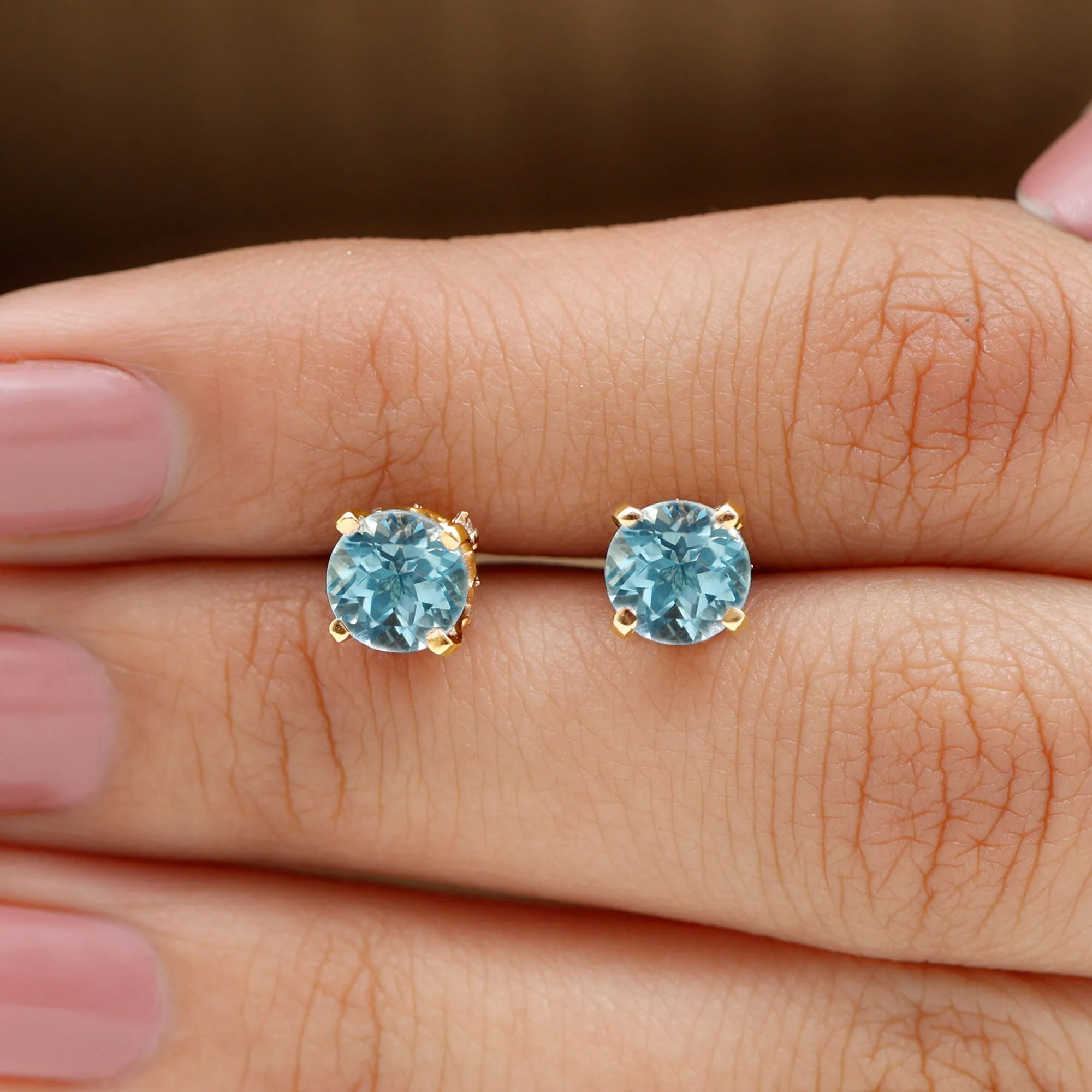Peg Head Set Sky Blue Topaz and Diamond Solitaire Stud Earrings